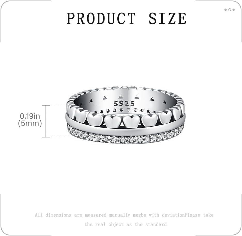 Close-up of interlocking hearts sterling silver band ring