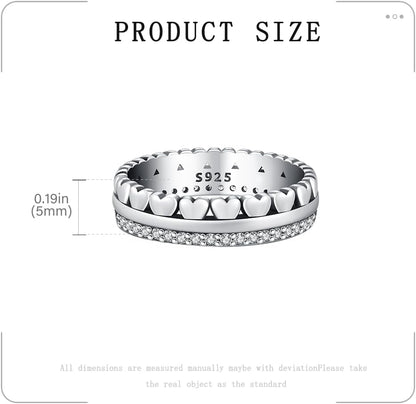Close-up of interlocking hearts sterling silver band ring