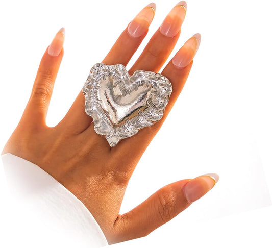 Large exaggerated chunky gold heart ring with puffy design