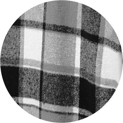 Plaid flannel shacket styled with jeans and casual sneakers