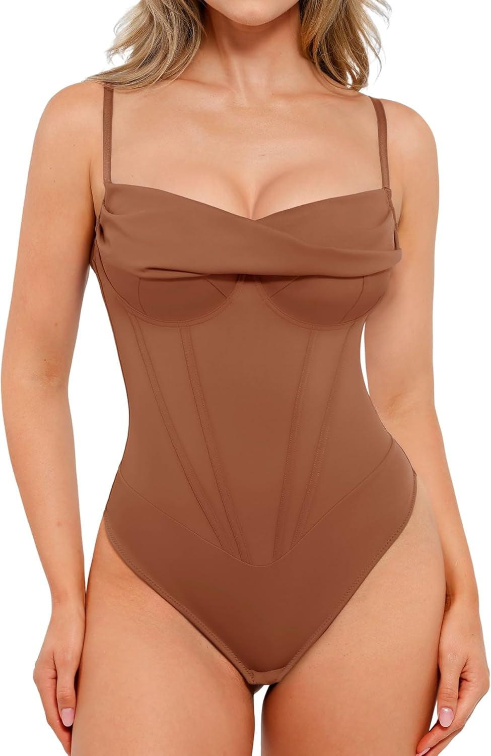 Black corset bodysuit going out top on model