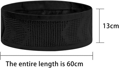 Woman wearing running waist belt during outdoor jogging and training