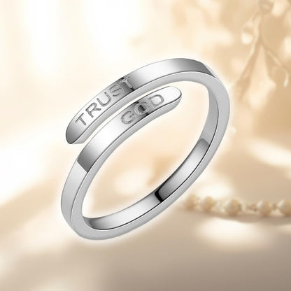 Adjustable religious ring worn on woman's hand silver finish