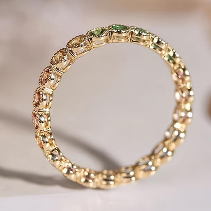 Elegant gold plated ring displayed on ring stand