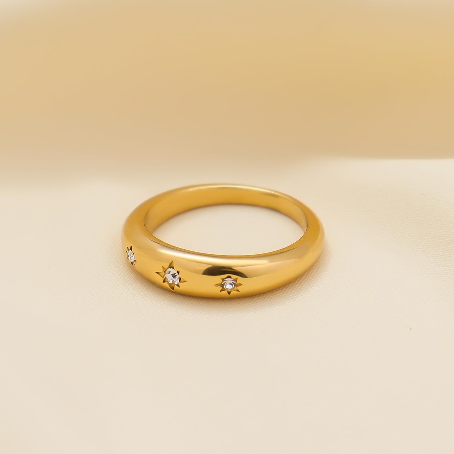 Gold statement ring with sparkling cubic zirconia star design