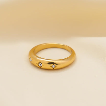 Gold statement ring with sparkling cubic zirconia star design