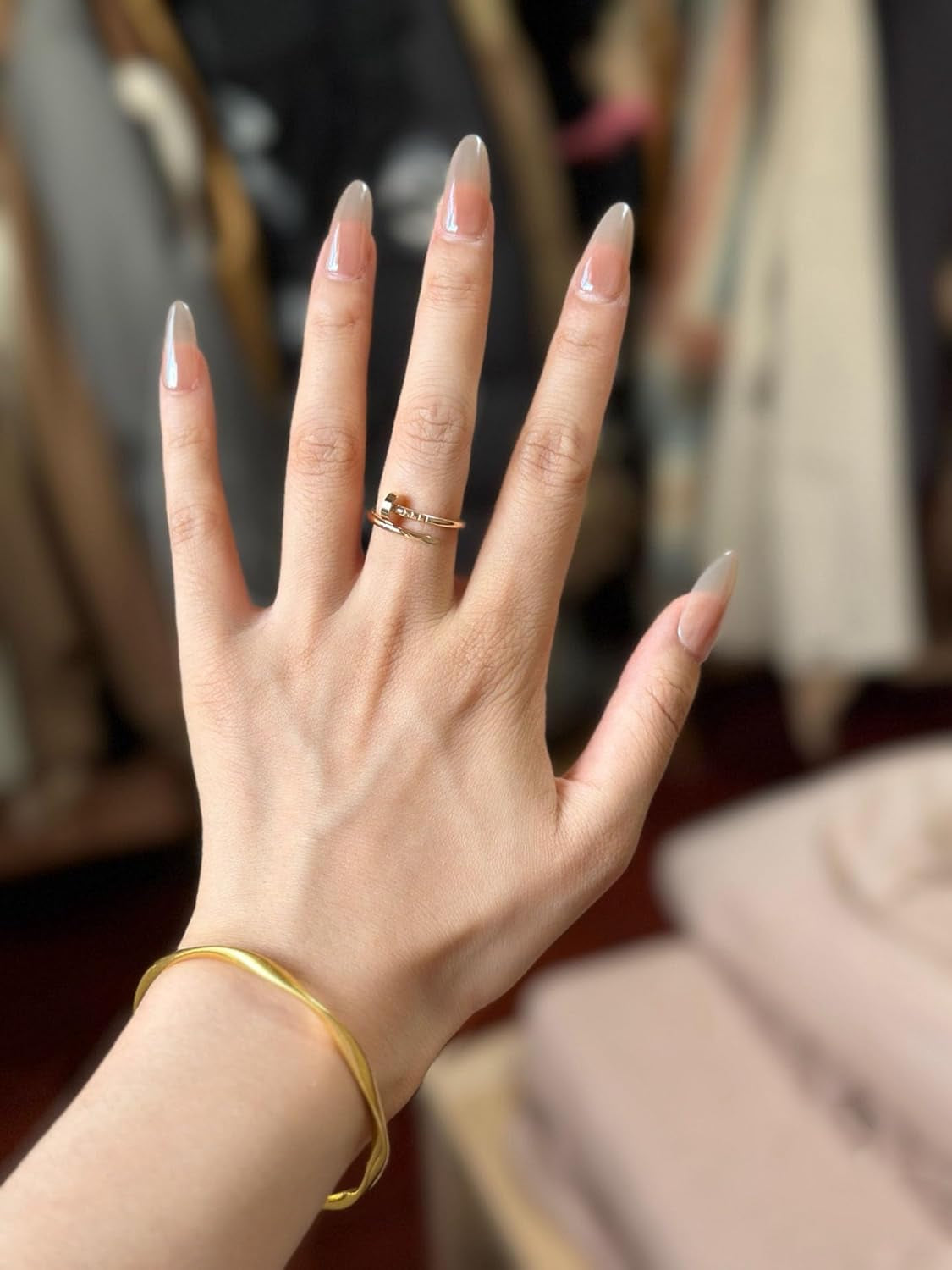 Elegant 18K gold-plated love ring showcasing premium finish quality
