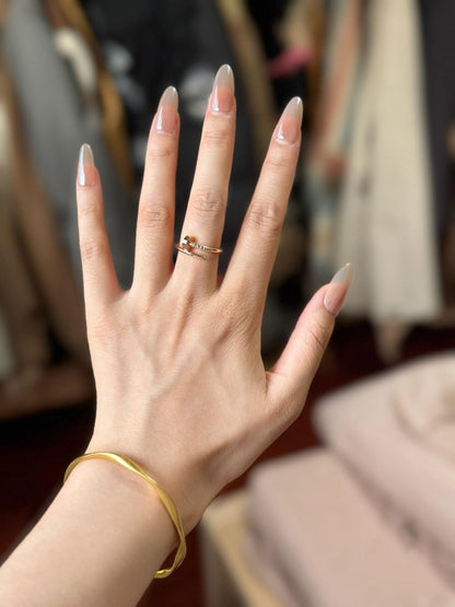 Elegant 18K gold-plated love ring showcasing premium finish quality