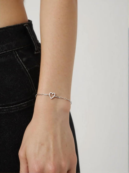 Aluinn gold heart charm bracelet detail and craftsmanship