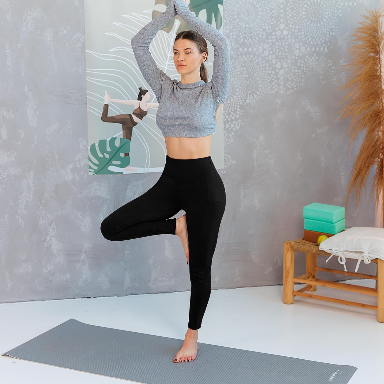 Women in gym wearing black leggings with pockets