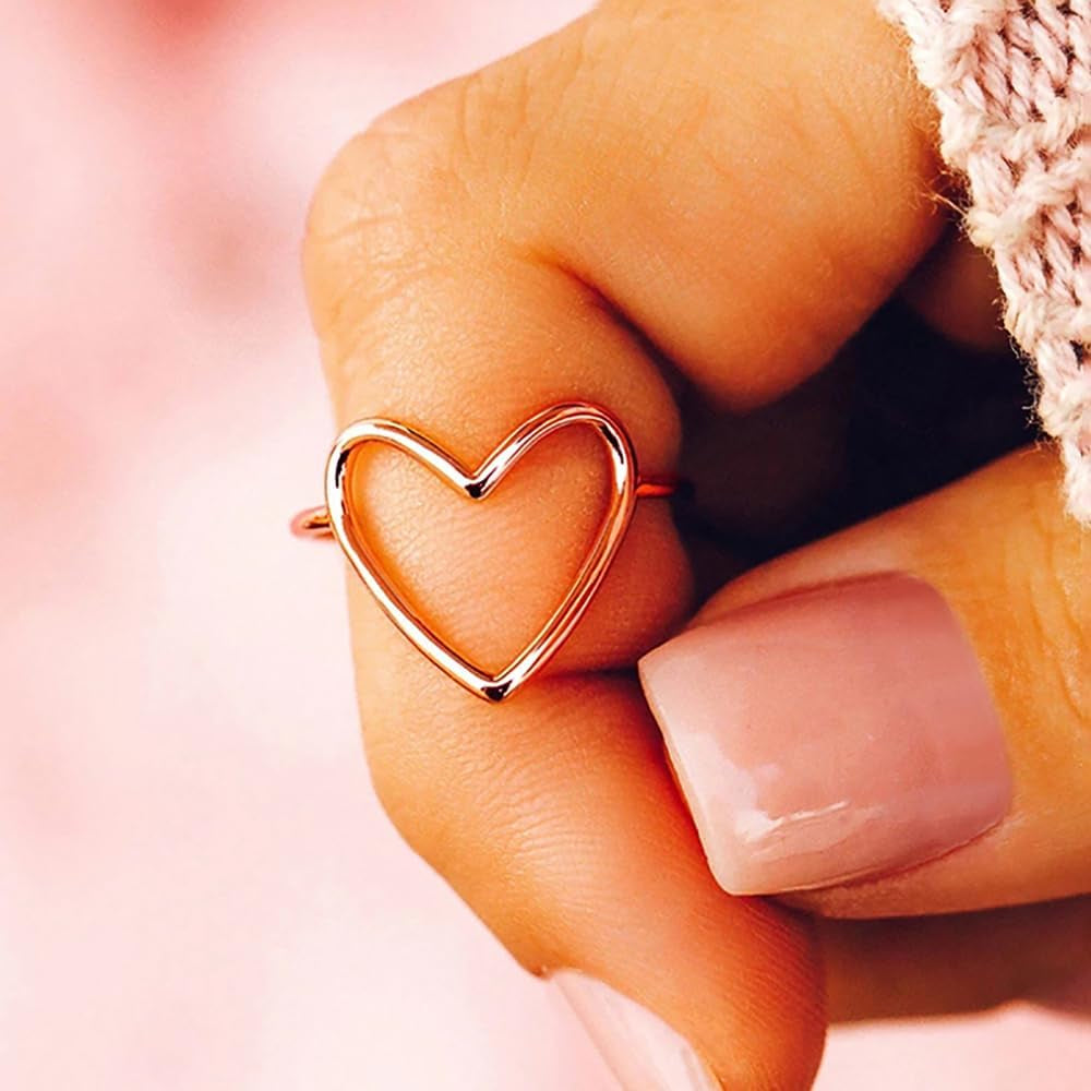 Close-up of hollow heart ring displaying elegant cutout heart design detail