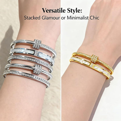 Mixed gold and silver stackable bracelets arranged together