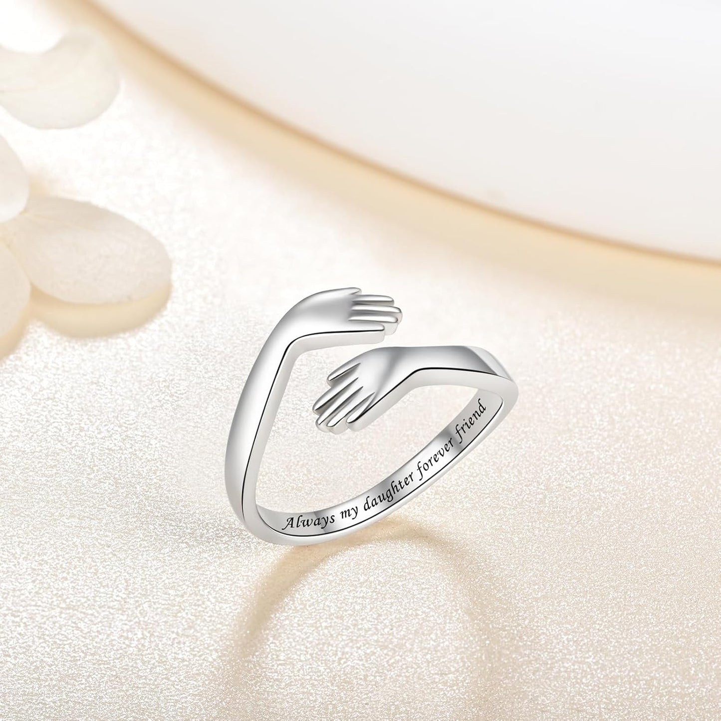 Hug rings for women close-up displaying continuous embrace detail