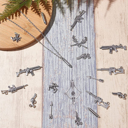 1 Box 40Pcs 10 Styles Gun Pistol Revolver Weapon Charms Pendants Craft Supplies Bow Arrow Charms Pendant for Jewelry Finding Making Accessory for DIY Bracelet