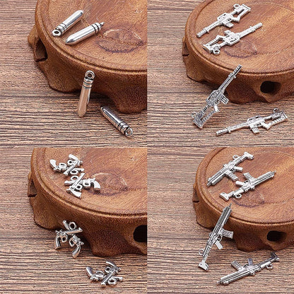 1 Box 40Pcs 10 Styles Gun Pistol Revolver Weapon Charms Pendants Craft Supplies Bow Arrow Charms Pendant for Jewelry Finding Making Accessory for DIY Bracelet
