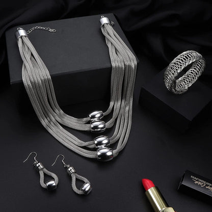 3Pcs Multi-Layer Bib Necklace Jewelry Set for Women Choker Necklace Stretch Cuff Bracelet Dangle Earrings Halloween Costume Jewelry Set Silver Tone