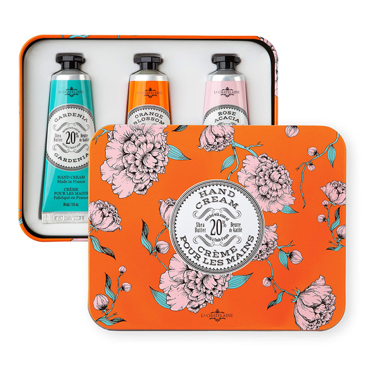La Chatelaine Hand Cream Trio Tin Gift Set, Plant-Based, Made in France with 20% Organic Shea Butter (Gardenia, Orange Blossom , Rose Acacia, or Passion Fuit or Cherry Almond) 3 x 1 oz Arts & Entertainment > Party & Celebration > Gift Giving La Chatelaine Cinnamon Orange, Gardenia, Rose Acacia 1 Fl Oz (Pack of 3) 