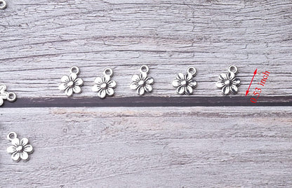 50 Pcs Little Flowers Charms Metal Vintage Cute Vintage Small Flower Pendants for Jewelry Making Kit Bracelet Necklace DIY Making Crafting Project Accessories Supplies (Silver)