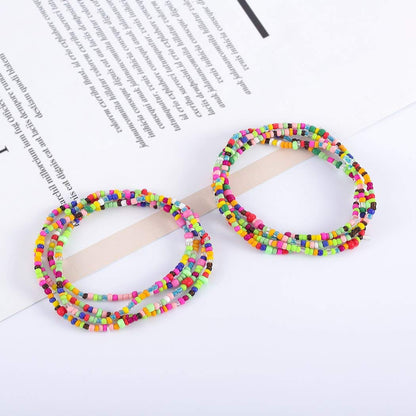 Bomine Boho Waist Chain Body Bead Belly Chains African Body Jewelry Bikini Chains Colorful for Women and Girls (Colorful-Purple) Apparel & Accessories > Jewelry > Body Jewelry Bomine Color mixing  
