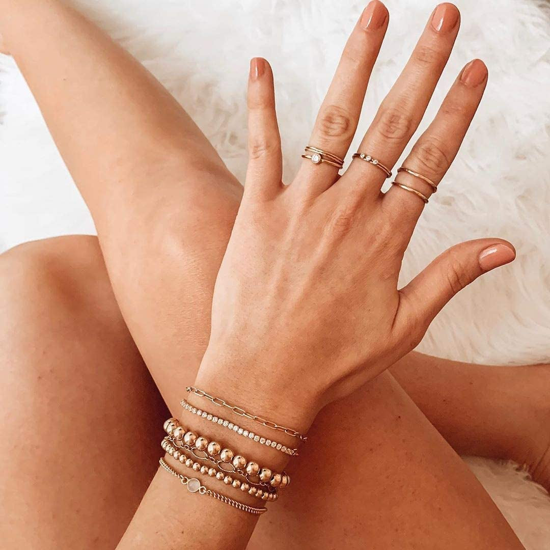 Reoxvo Dainty Gold Beaded Bracelets Set for Women 14K Gold Plated Stackable Bracelets for Women Elastic Stretch Gold Bracelet Trendy Jewelry Apparel & Accessories > Jewelry > Bracelets Reoxvo   