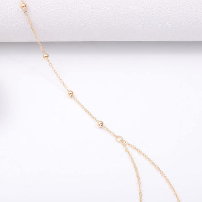 Jerany Boho Gold Body Chain Small Bead Sexy Bra Bikini Waist Body Necklace Beach Body Chains for Women and Girls Apparel & Accessories > Jewelry > Body Jewelry Jerany   