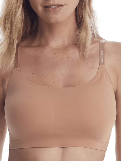 Calvin Klein Women's Invisibles Comfort Seamless Adjustable Skinny Strap Bralette Bra Light Chestnut / X-Small