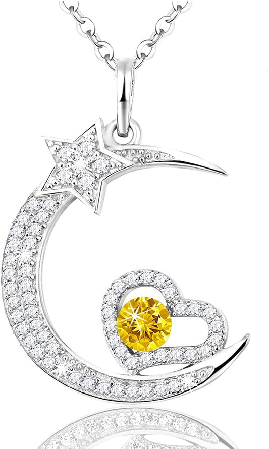 Blue topaz stone detail in moon shooting star pendant sterling silver