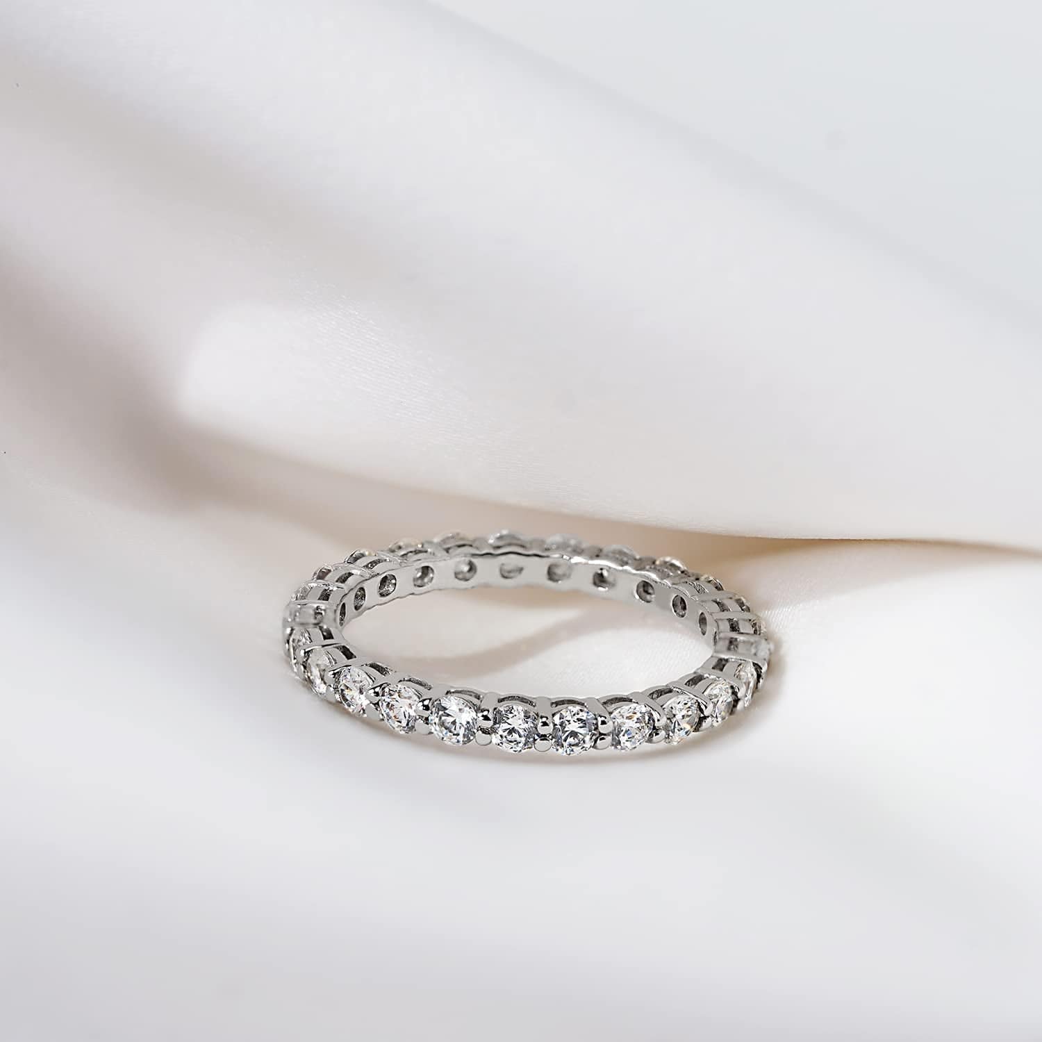 Collection Platinum or Gold Plated Sterling Silver All-Around Band Ring Set with round Infinite Elements Zirconia