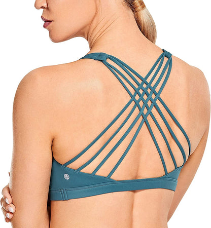 CRZ YOGA Strappy Sports Bras for Women - Criss Cross Back Sexy Wireless Padded Yoga Bra Cute Workout Stone-washed Indigo / Medium