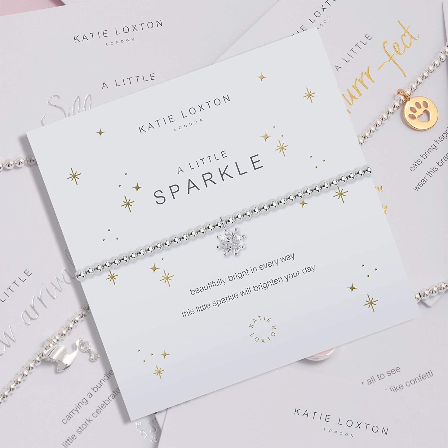 KATIE LOXTON a Little Magic Womens Stretch Adjustable Band Fashion Charm Bracelet Apparel & Accessories > Jewelry > Bracelets Katie Loxton   