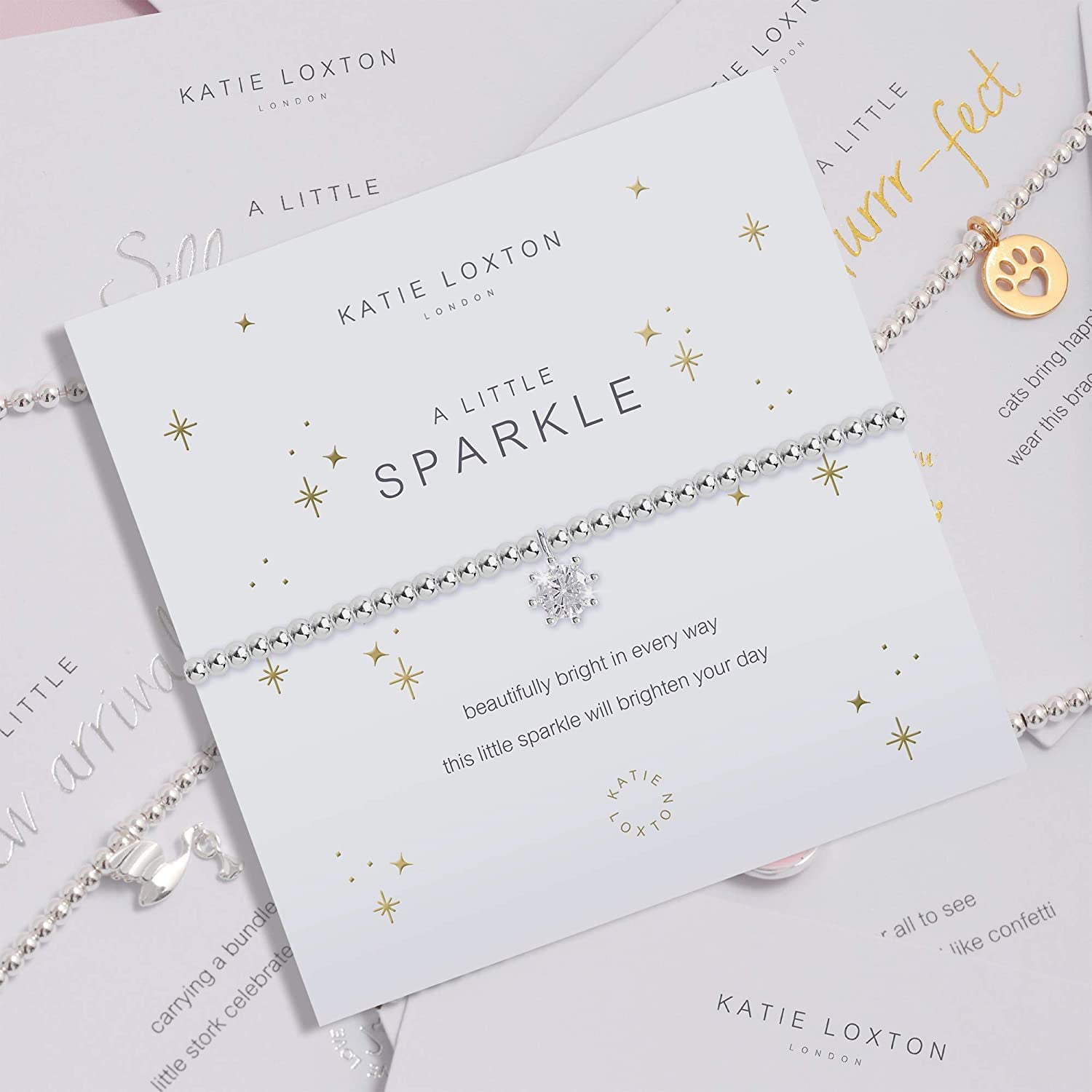 KATIE LOXTON a Little Magic Womens Stretch Adjustable Band Fashion Charm Bracelet Apparel & Accessories > Jewelry > Bracelets Katie Loxton   