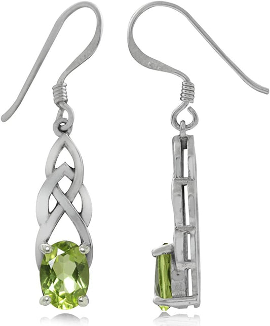 Woman wearing elegant silver Celtic knot earrings