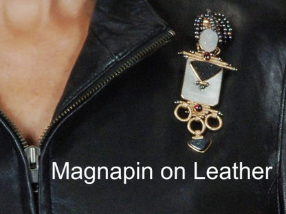 Magnapin Is A, Reusable Accessory Used to Attach Any Item with a Pin, Brooch, Name Tag to Fine Garments. Use Magnapin on Fabrics Such as Satin, Leather, Suede, Linen, Silk and Even Fur.