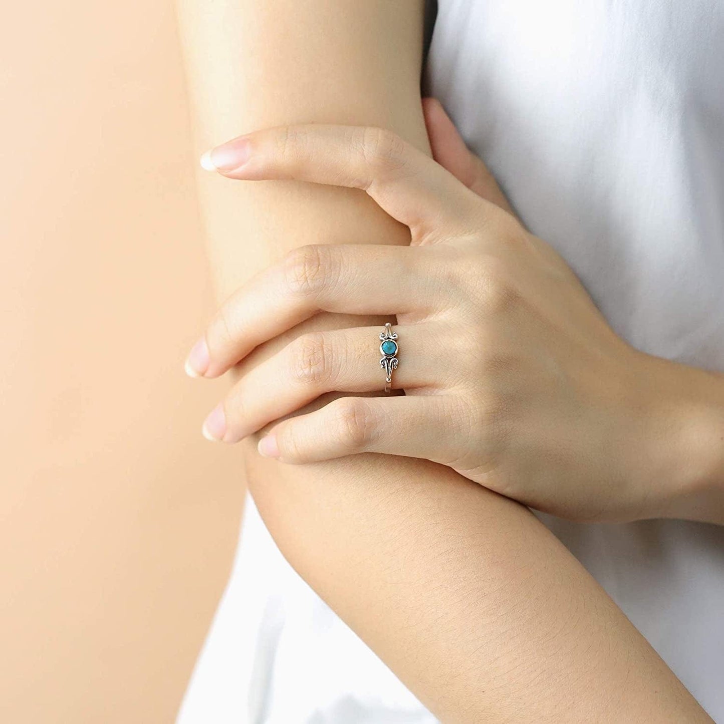 Sterling Silver round Turquoise Ring with Scrolling Side Detail